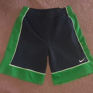 Boy's Nike shorts size 6. Blue and green